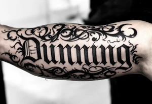 Dunning , Details include Old English Font, white space in name tattoo idea