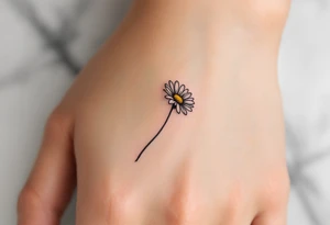 A band with a single engraved daisy tattoo idea