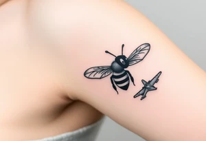 bee with a pilots hat flying next to a jet plane tattoo idea