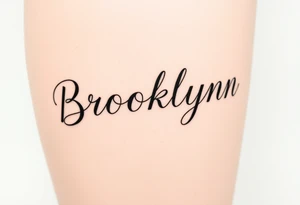 My daughter's name, Brooklynn, in cursive  font tattoo idea