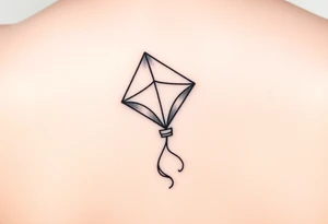 hand letting go kite tattoo idea