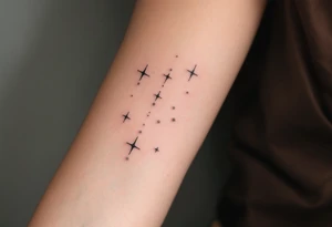 A subtle Sagittarius tattoo using only tiny white dots for stars, placed behind the ear. tattoo idea
