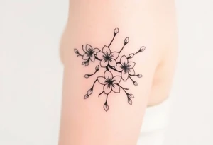 delicate cherry blossoms swirling in spring breeze with petals tattoo idea