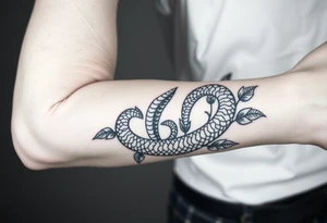 Large mythical serpent near plants tattoo idea