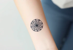 A minimalist black ink Flower of Life, centered on the forearm, with perfect geometric symmetry in cyrcle round tattoo idea