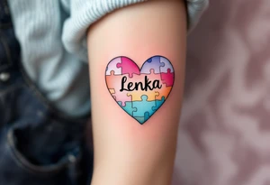 A heart made of puzzle pieces, each piece a different pastel, with name Lenka in the center. tattoo idea