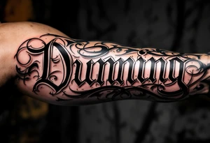 Dunning , Details include Old English Font, white space in name tattoo idea