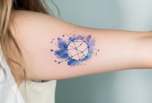 Soft watercolor shades of blue and lavender cradle the Libra star constellation pattern beneath a minimalist zodiac symbol tattoo idea