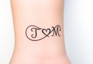 An infinity symbol with two initials T and M on each loop and a tiny heart in the center in black ink tattoo idea