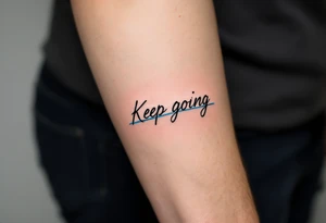 “Keep going” in sleek gray cursive, underlined with a cool blue wave. tattoo idea