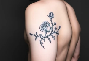 tattoo of a rose thorn vine sewn inside and wrapping around the forearm tattoo idea