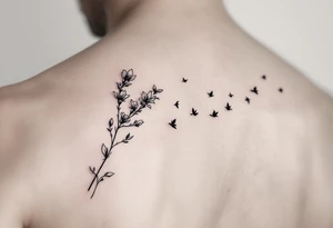A wood violet blowing in the wind with pedals floating away turning into birds tattoo idea