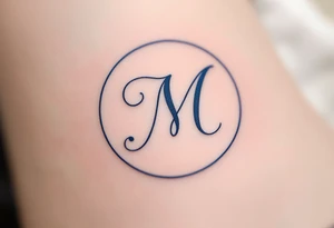 An elegant serif "M" in midnight blue, placed within a fine circular frame. tattoo idea
