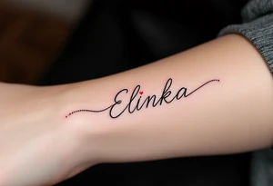 A delicate red heart with the name Elinka written in flowing script across the center. tattoo idea