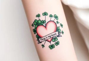 A ton of green shamrocks together with a big pale pink heart with a banner across the heart that says Peg 'o My Heart tattoo idea