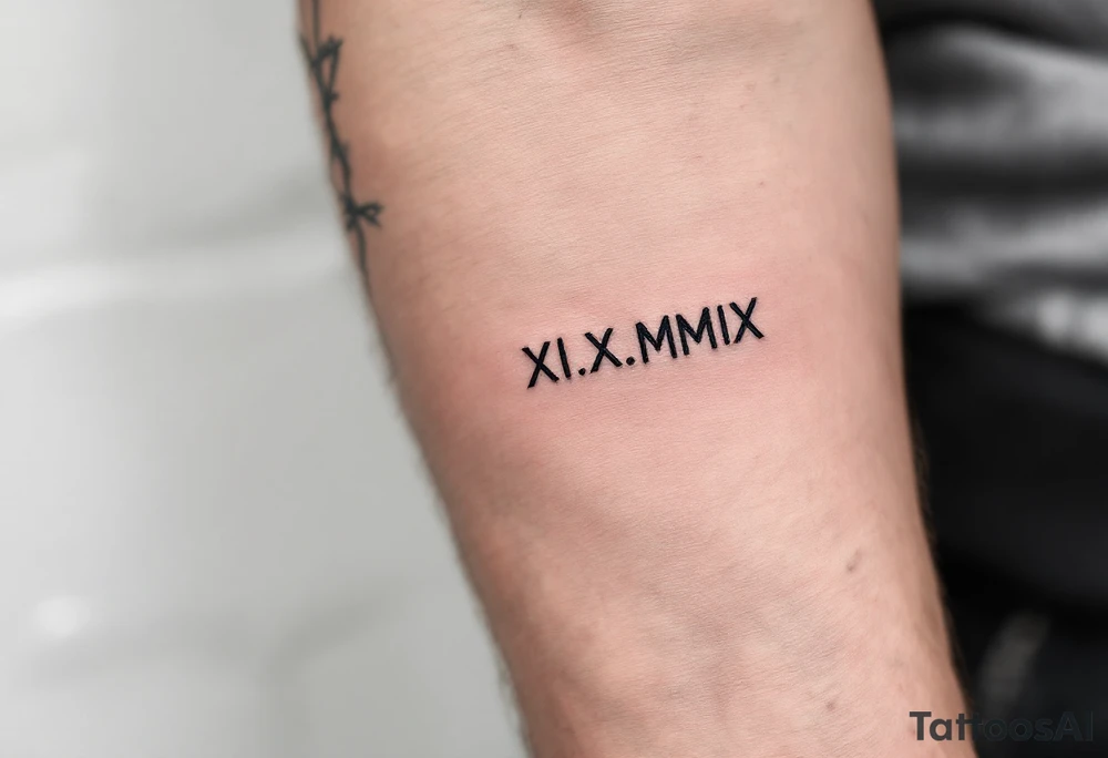 XI.XI.MMIX inked in matte black on the hand’s edge, accompanied by silver barbed wire surrounding it. tattoo idea