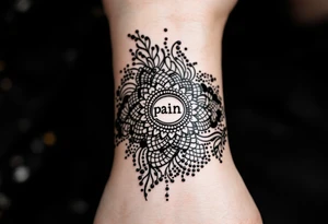 Indian style Henna tattoo for the inner wrist include the word pain in small font tattoo idea