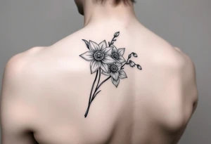 shoulder tattoo for women with bouquet of daffodils, daisy, lily of the valley tattoo idea