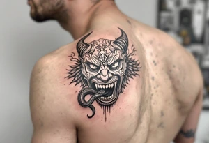 Purépecha style tattoo above   oni mask with a snake in its mouth tattoo idea