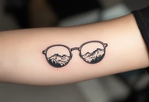 Glasses that show the world clearly
One lens can be made cloudy or cracked, and the other crystal clear, showing mountains, sky or nature. tattoo idea