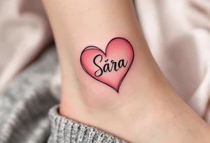 A heart shaded in pinky with Sára in a handwritten-style font inside. tattoo idea