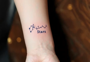 A quote in icy blue ink crosses the wrist with a constellation pattern forming the final word: Stars. tattoo idea