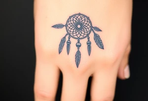 native dreamcatcher with flowing feathers and sacred beads tattoo idea