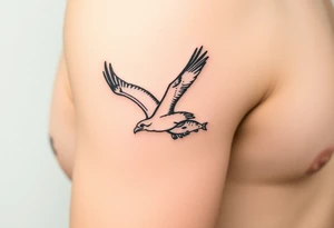 Osprey in flight with fish grasped between its talons tattoo idea