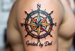 A colorful compass rose with “Guided by Dad” lettered in black under the north point. tattoo idea