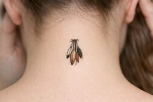 A native American hair piece of feathers on leather strips with beads to be placed on side of my neck as if coming from my hair, for Sioux woman tattoo idea