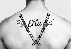 Ella with hockey sticks for L tattoo idea
