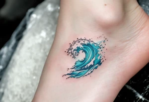 A turquoise wave crashes in delicate linework on the ankle, accented with silver highlights. tattoo idea