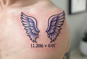 pair of angel wings enclosing name Linda and numbers 1.1.2016 v 0:01", done in light gray and faded lilac. tattoo idea