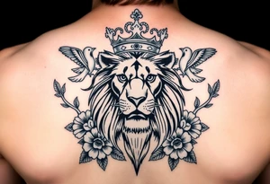 powerful majestic lion with a crown, surrounded by floral ornaments and birds tattoo idea
