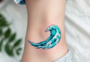 A turquoise wave crashes in delicate linework on the ankle, accented with silver highlights. tattoo idea