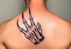 Freddy Krueger showing his claw tattoo idea