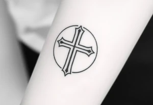 Cross a omaha ne 
In the back round tattoo idea