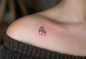 A minimalist black outline of two pinky fingers linked together, one small and one large, symbolizing an unbreakable bond. tattoo idea