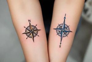 One wears a compass pointing north in black and gold, the other a compass pointing south in silver and blue, symbolizing guidance and connection. tattoo idea