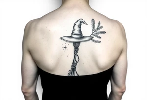 Which is broom with a witches hat with vines and feathers on your leg 
Smaller broom with hat placed on top or in the middle tattoo idea
