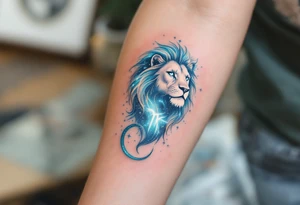 A celestial lion formed from stardust and soft gray shading lies beneath the Leo glyph, glowing in a wash of indigo and teal. tattoo idea
