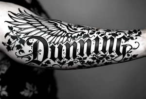 Dunning,on left forearm details include angel wing, greek type of font,jungle leaves , tiger claw scratch tattoo idea