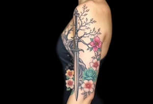 based on the Lord of the rings movies with the tree of Gondor, the Evenstar, the sword Narsil, and flowers tattoo idea