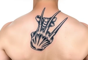 Freddy Krueger showing his claw
Q tattoo idea