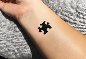 small, delicate tattoo in memory of my sister. We used to do puzzle together so I want one puzzle piece.  I want to include her handwritten message I have that says "to my favorite sister" tattoo idea