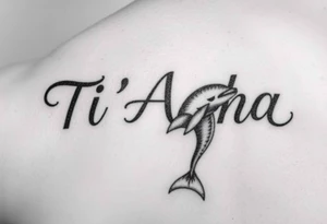 The name Ti'Asha with a dolphin for my mom favorite animal on the bicep tattoo idea