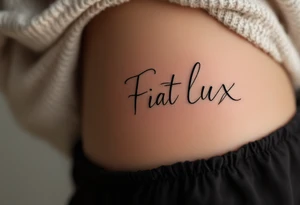 "Fiat Lux" (Let there be light), in cursive using light gold ink and pale gray shadows for contrast. tattoo idea