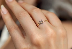 A thin, delicate gold ring tattoo tattoo idea