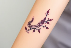 A bracelet wrapped around the arm dragon with purple and red tones, feathers and vines tattoo idea