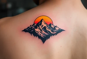 A sunset-hued mountain range represents the serenity and freedom of nature. tattoo idea